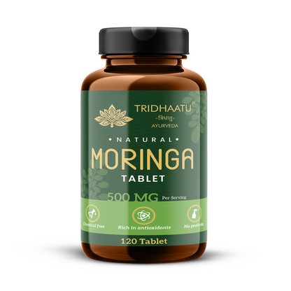 Bottle of Tridhaatu Moringa tablets on a white background