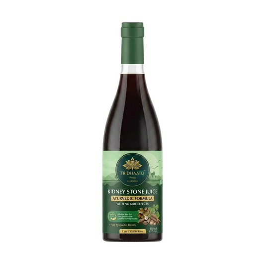 A bottle of Tree Hartli Kidney Stone Juice Ayurvedic Formula, featuring a dark glass bottle with a green cap and a green label, set against a light gray background.