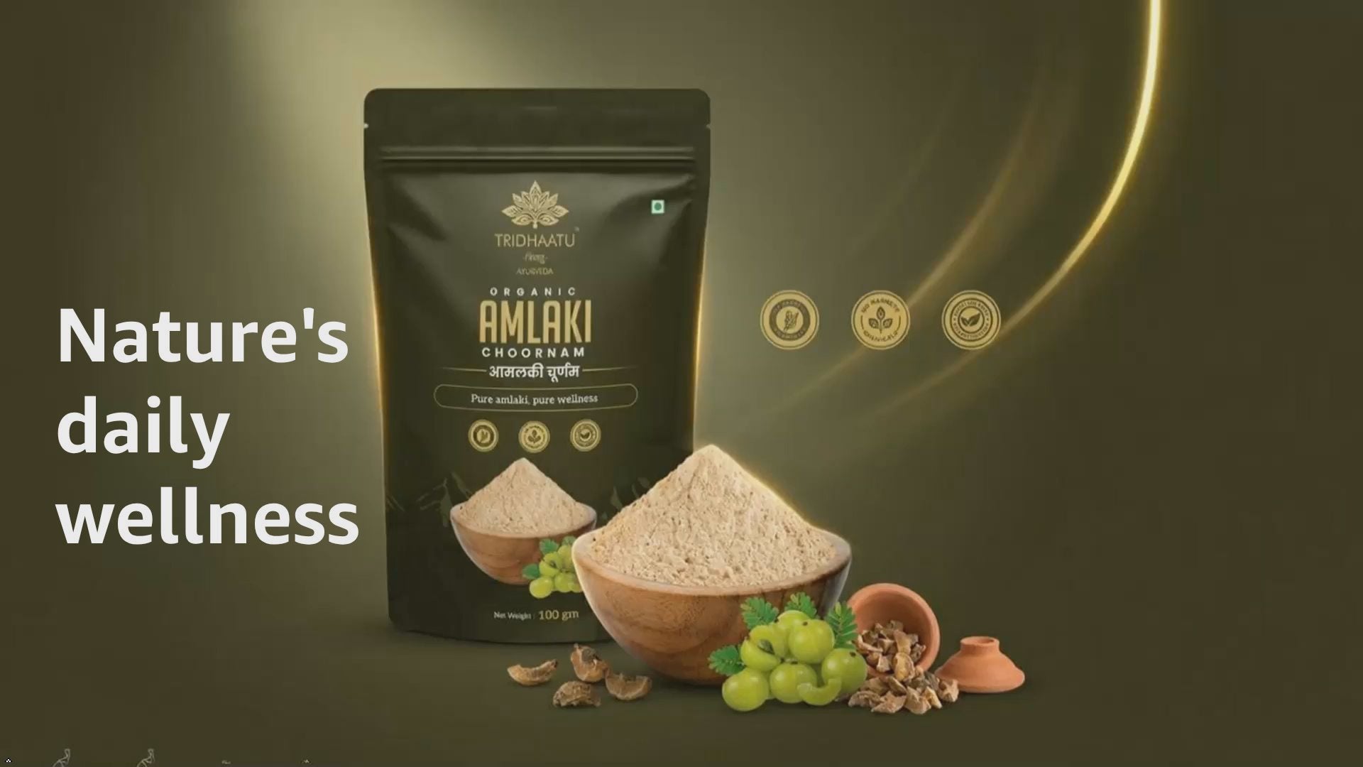 Tribhuvan Organic Amlaki Chodiram packaging with amlaki fruits and powder on a wooden board.